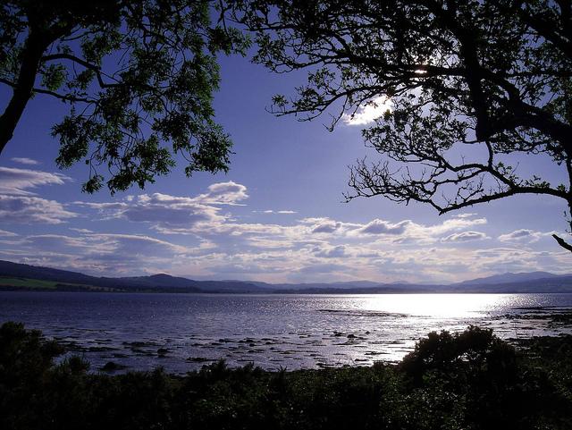 Redcastle Bay looking towards the mountains of Western Inverness-shire and Ross-shire Black Isle Scotland